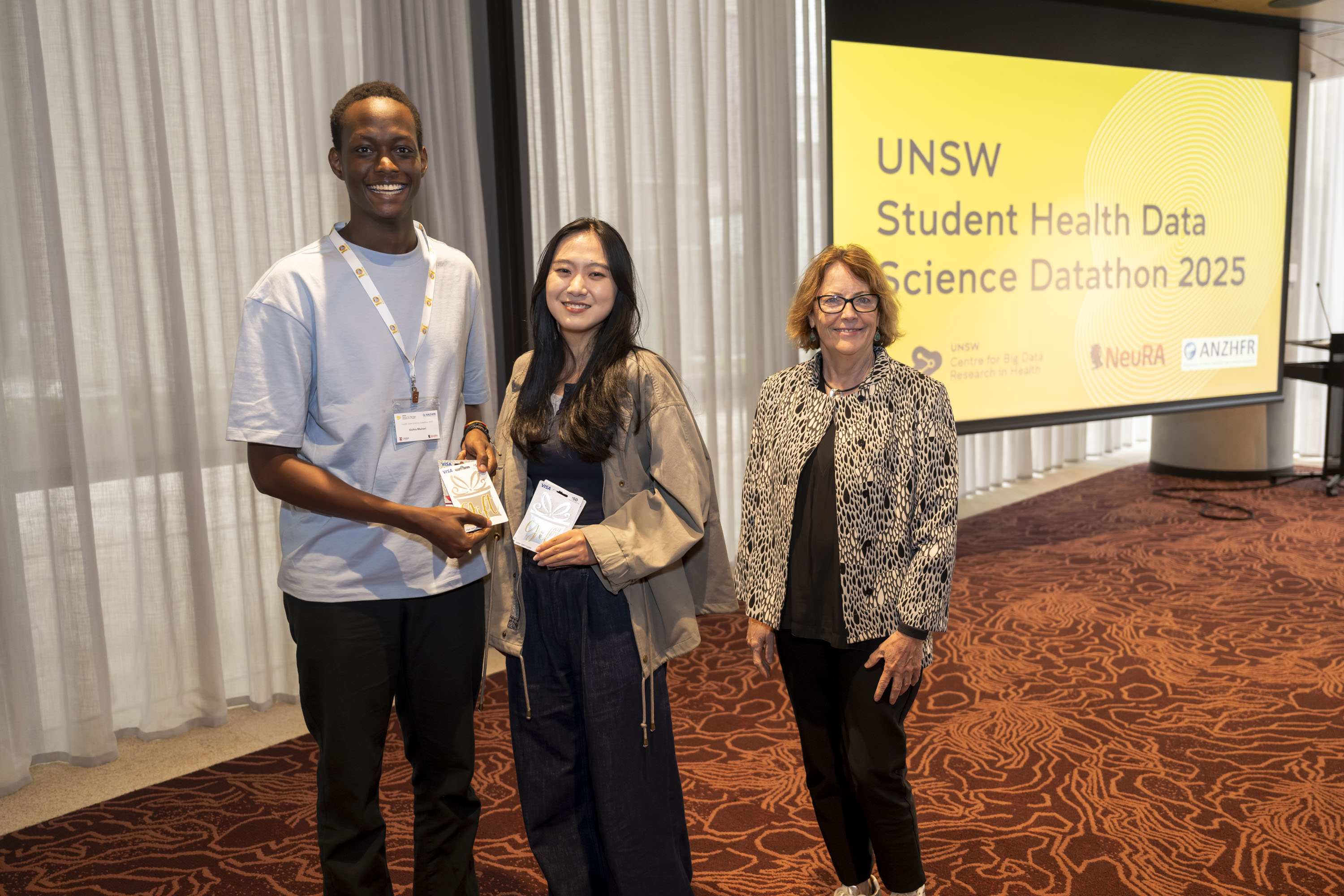 Fourth Place: Gichia Muiruri, Vivian Jiang and Professor Cheryl Jones (Dean, Faculty of Medicine and Health) Credit: Cassandra Hannagan