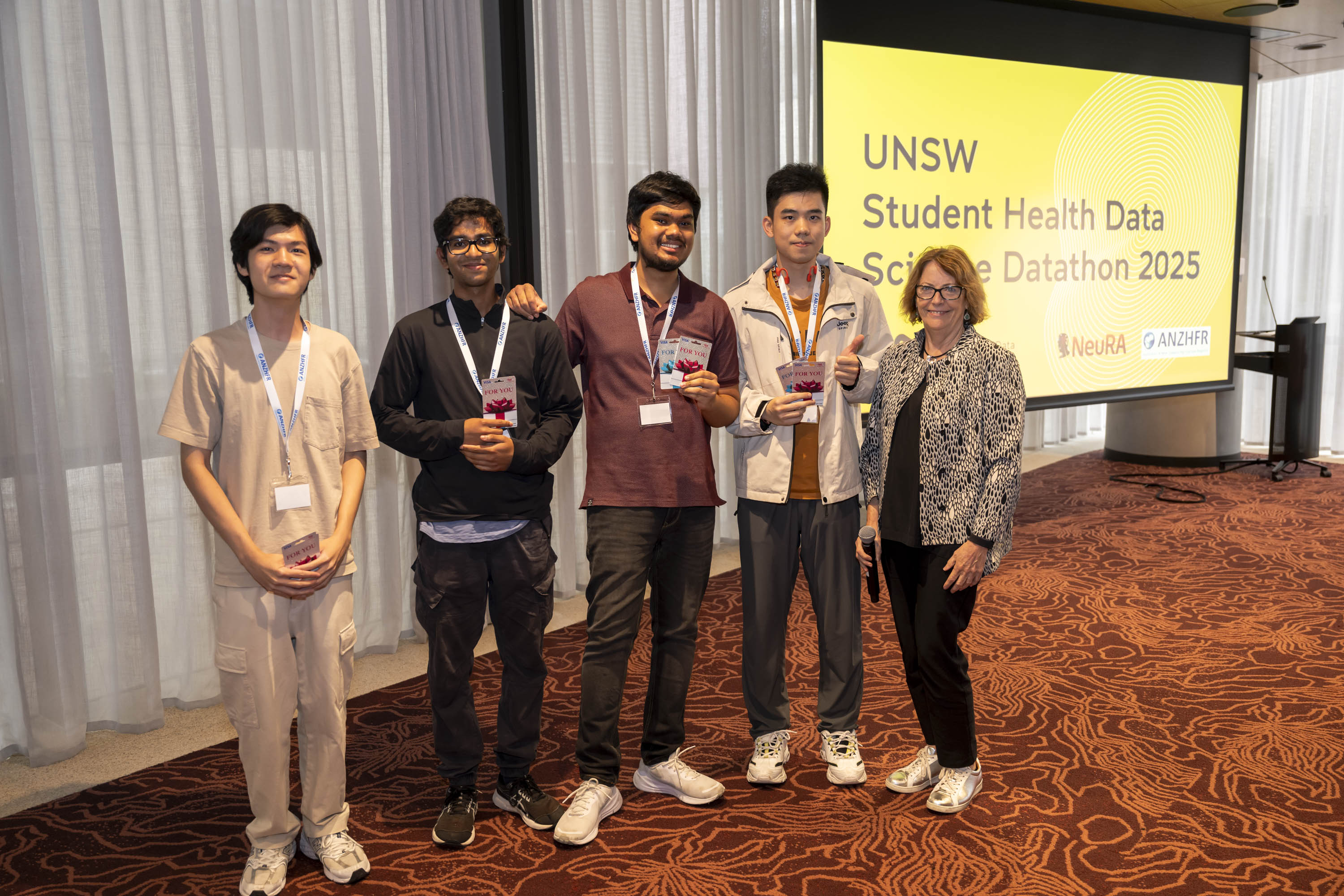 Winners: Quang Minh Phan, Lithira Mahagoda, Yashwanth Madan, Junle Zhou and Professor Cheryl Jones (Dean, Faculty of Medicine and Health) Credit: Cassandra Hannagan